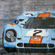 Illustration for article titled The most iconic race cars in history captured in beautiful paintings